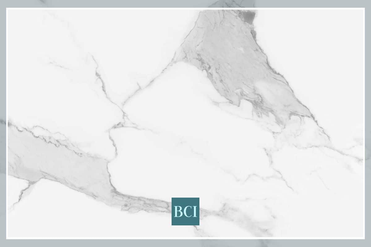 Photo of white and grey marble countertop. Marble is one of the most popular types of stone countertops. 