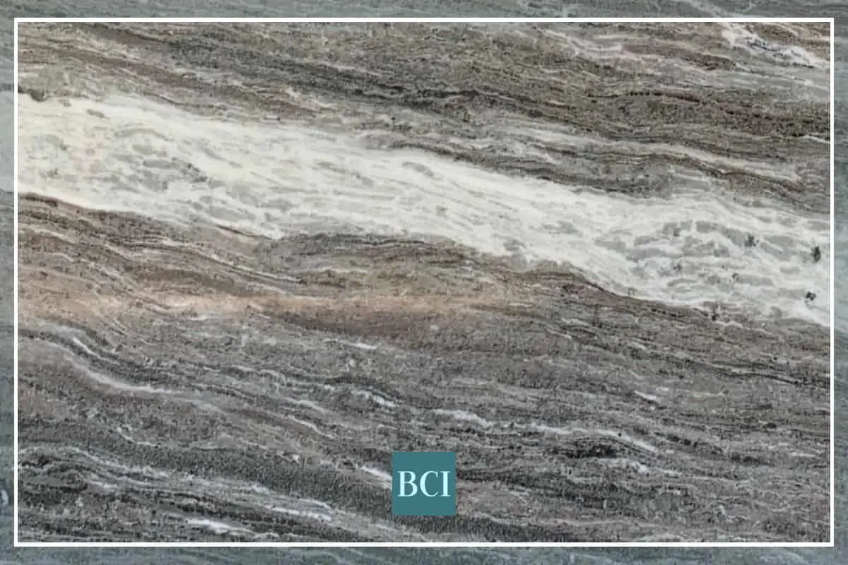 Photo of Fantasy Brown Quartzite countertop slab with shades of cream, tan, and warm grey.